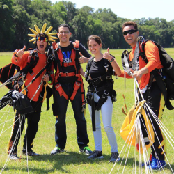 Celebrating their safe tandem skydive near Tampa Florida